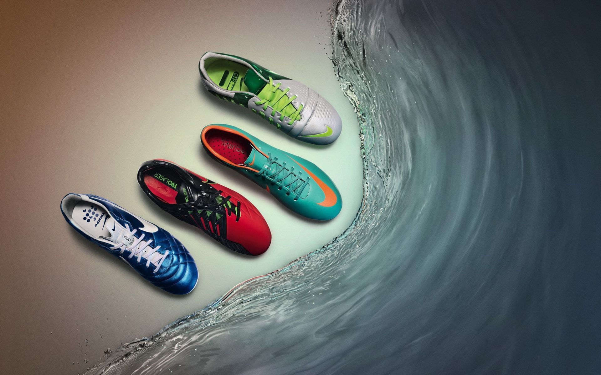 Four Nike football boots on a gradient background with a stylized water effect