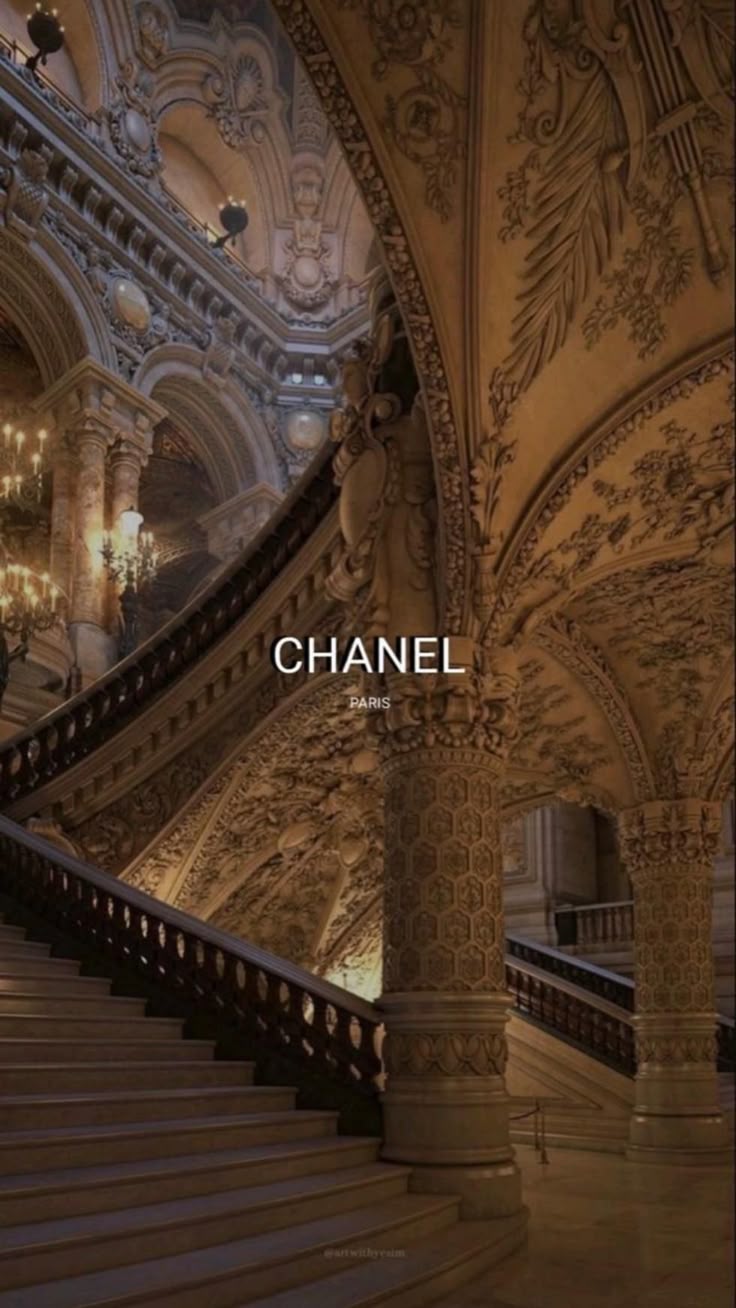 Luxury Chandelier Hanging Above Stairs Wallpaper