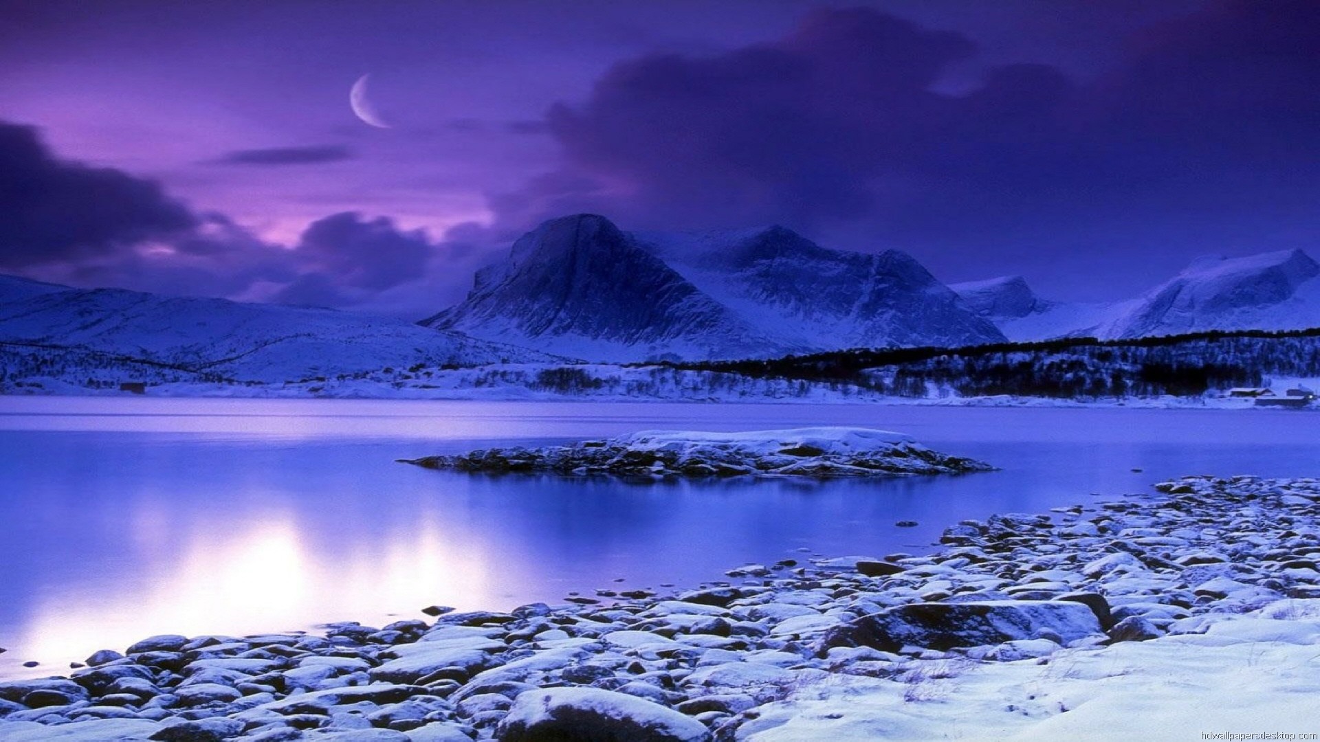 Stunning 1920x1080 HD wallpaper of a serene winter landscape with snow-capped mountains, a tranquil lake, and a crescent moon in the twilight sky