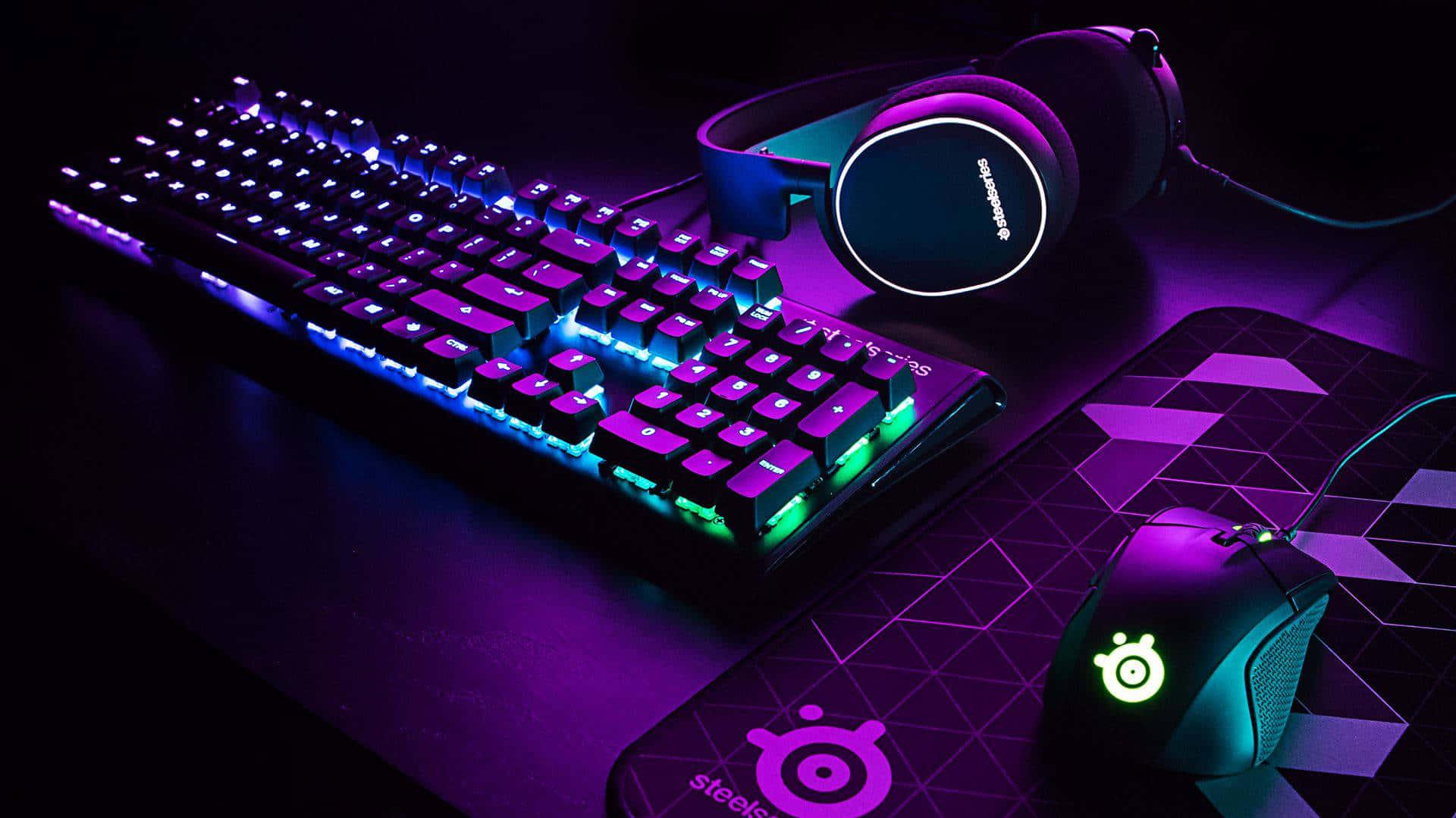 A Puter Keyboard And Mouse With Purple Lights