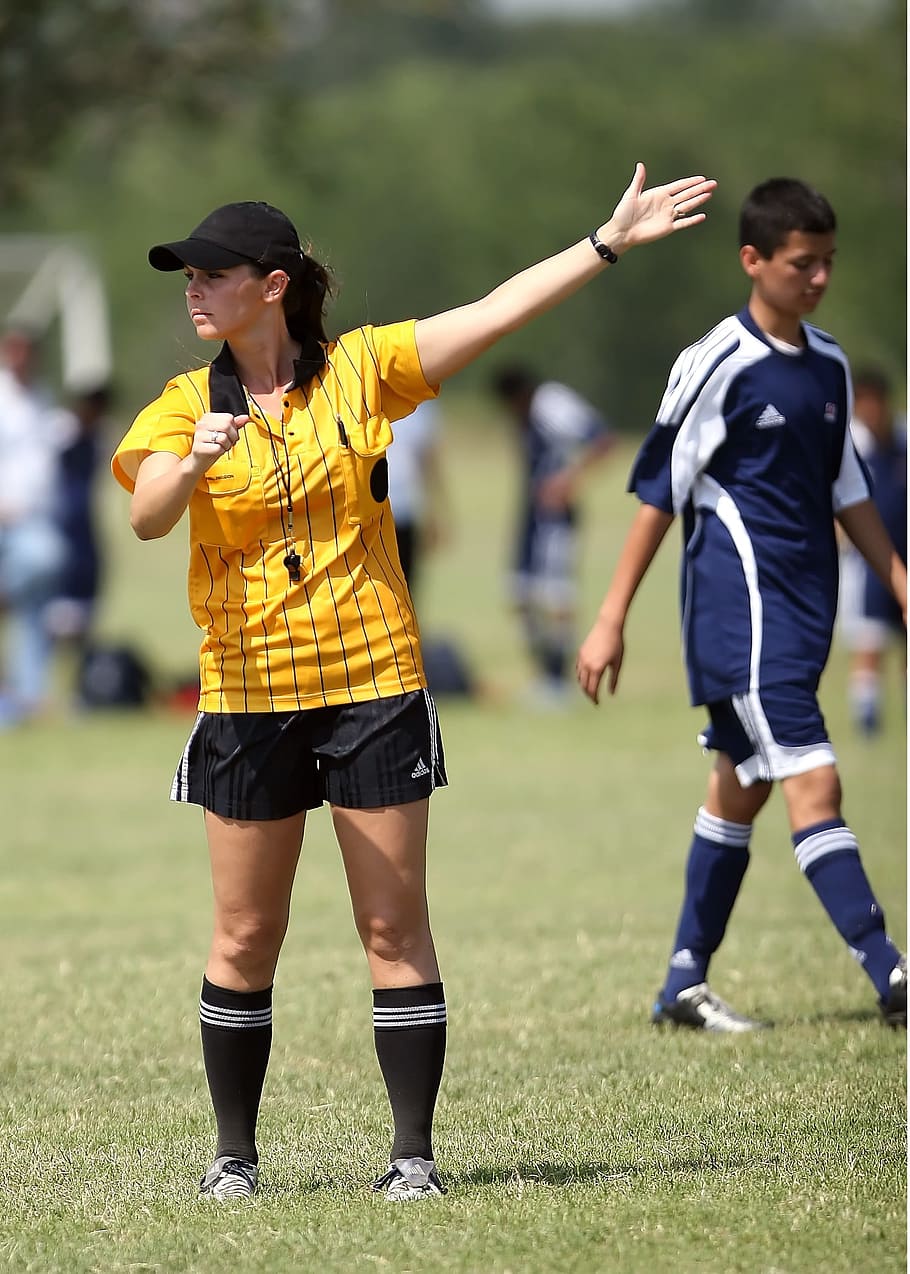 HD Wallpaper Female Referee Rising Left Hand On Green Open Field