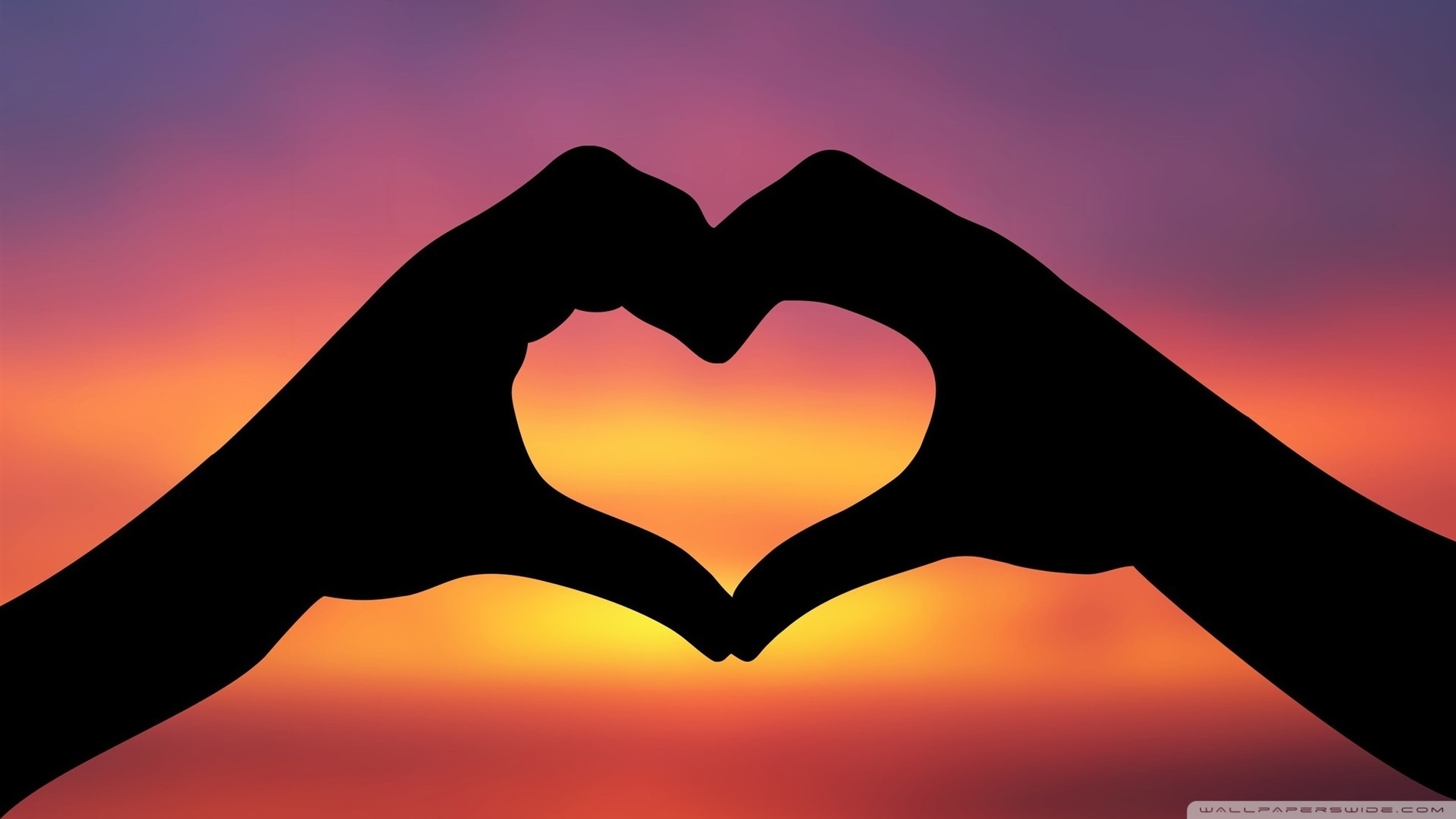 Hands Making A Heart In The Sunset Wallpaper