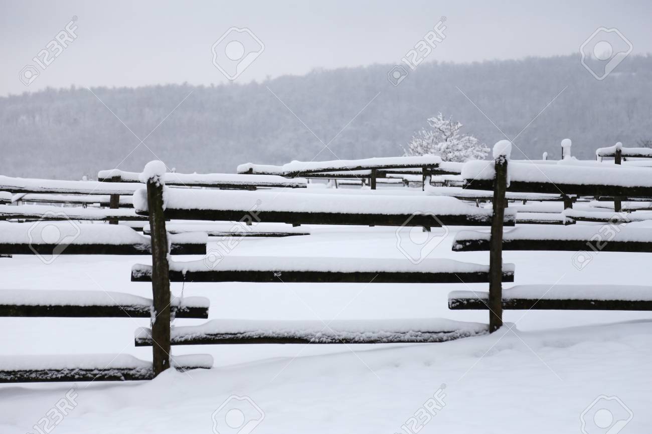 Photo Of A Fabulous Snowy Corral As Winter Background Stock