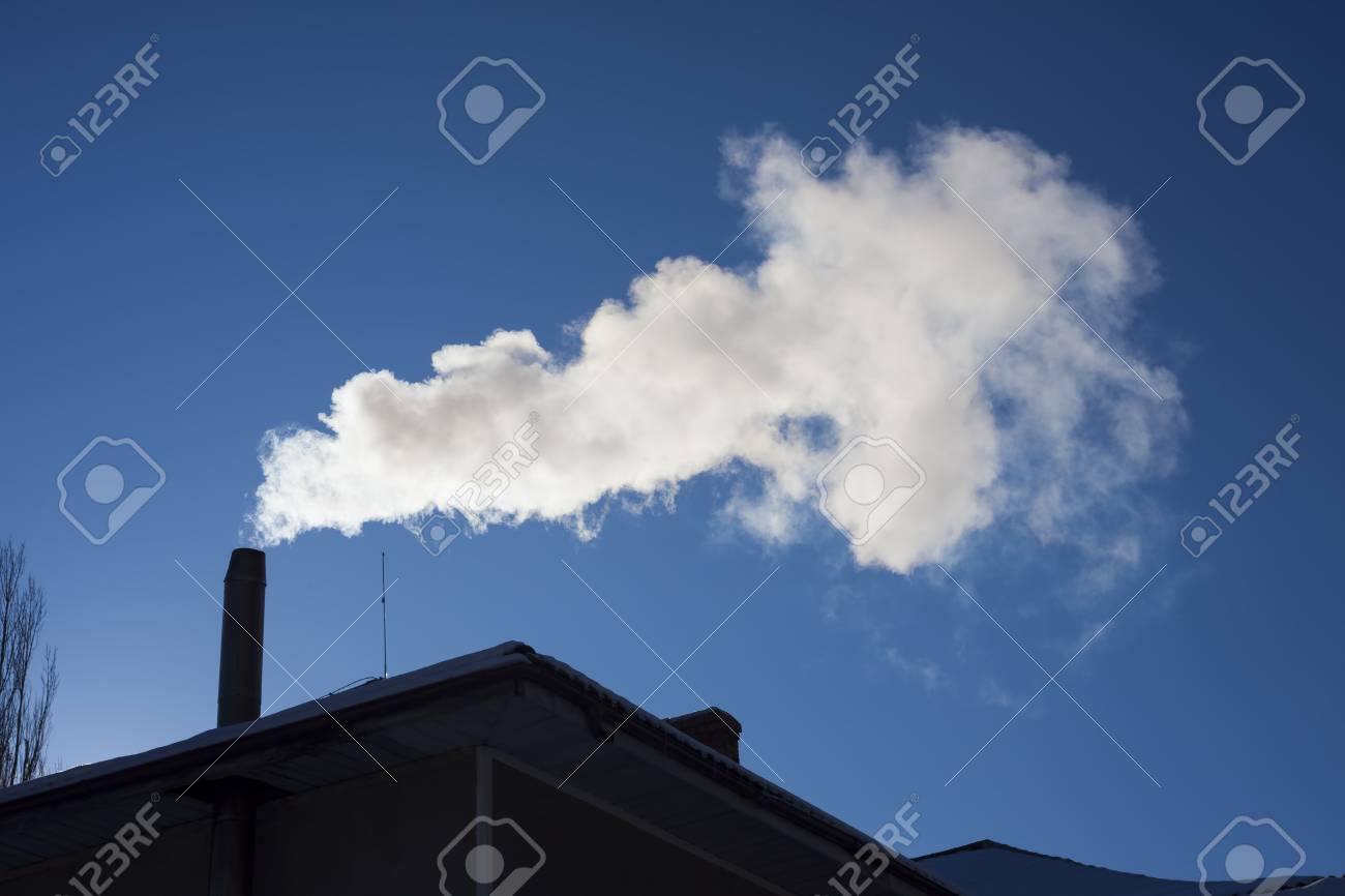 Smoke Ing Out Of House Chimney Blue Sky Background Stock Photo