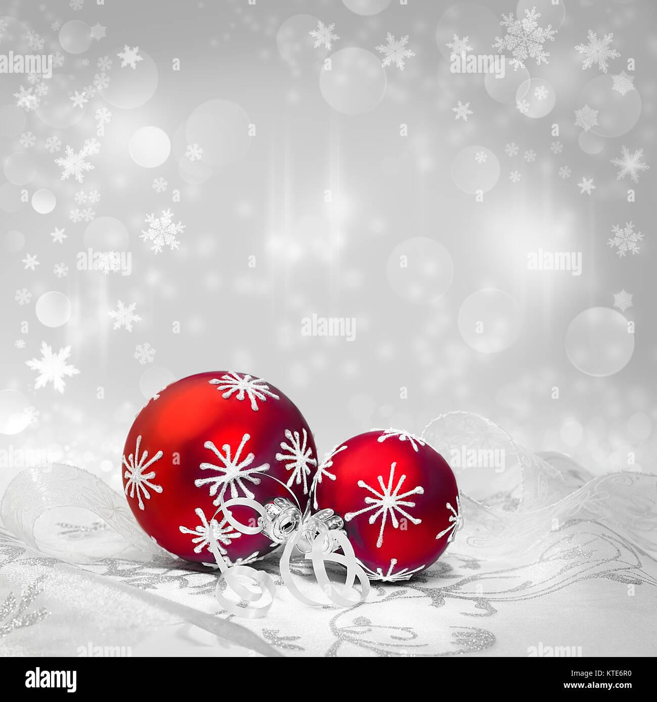 Red Christmas Decorations With Silver Ornament On Neutral Winter