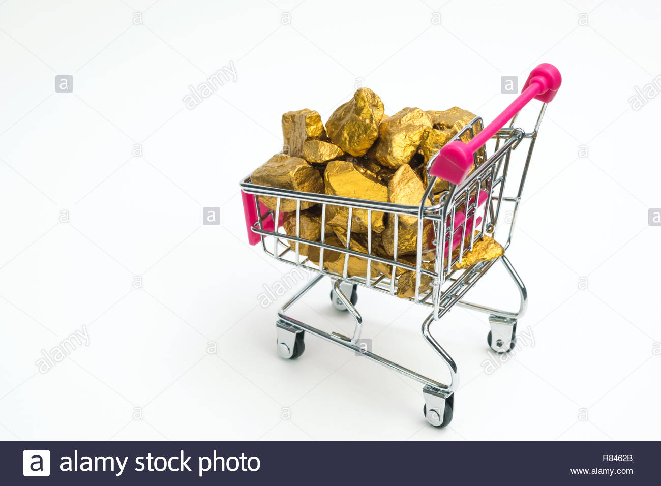 Pile Of Gold Nuggets Or Ore In Shopping Cart Supermarket