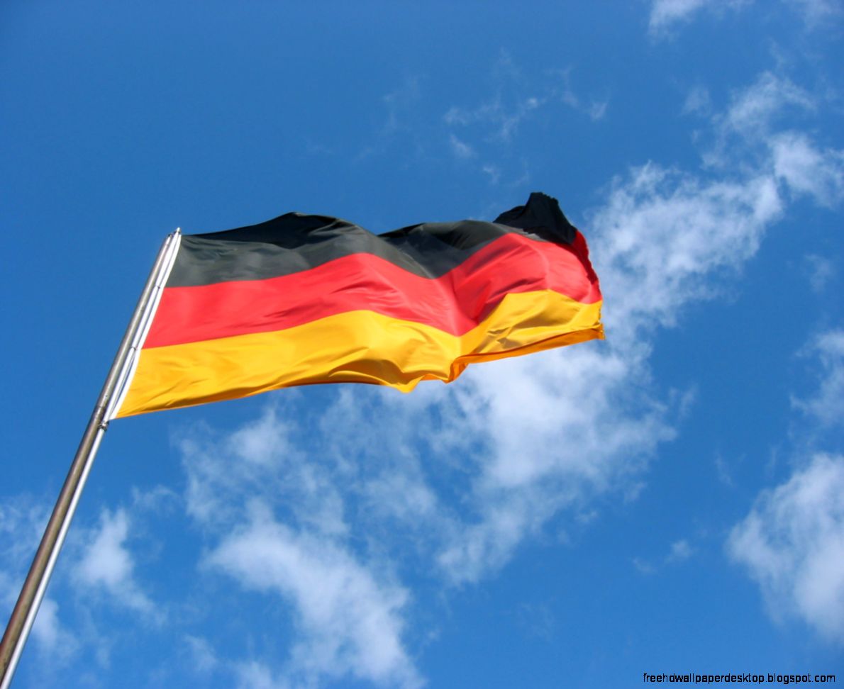German Flag Flying Aganist A Blue Sky Wallpaper High Definition