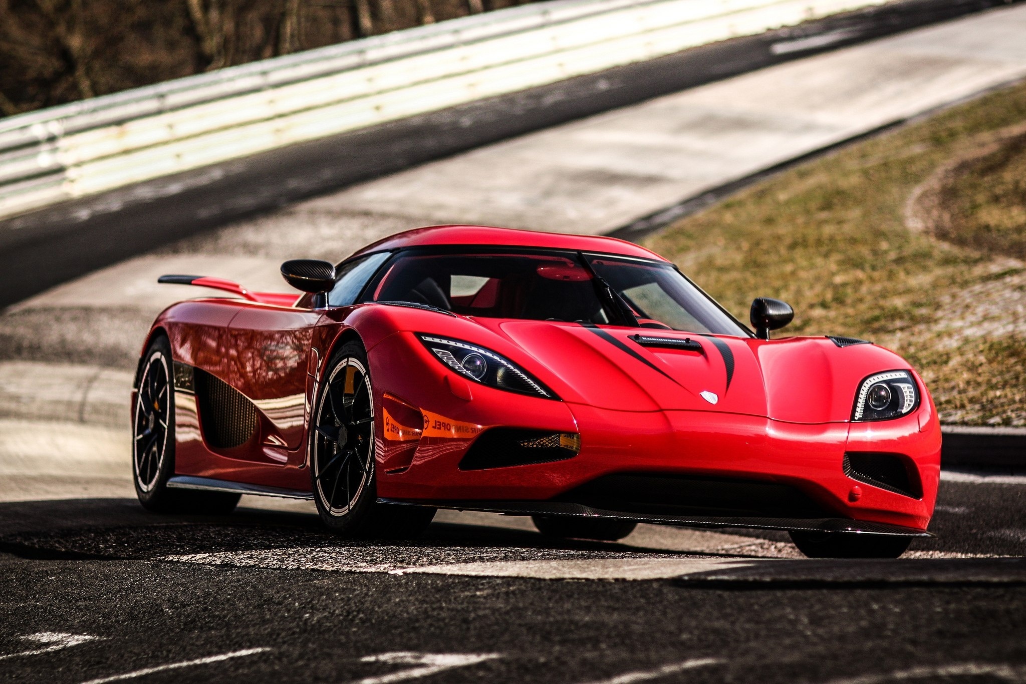 Red Koenigsegg Agera RS on a racetrack