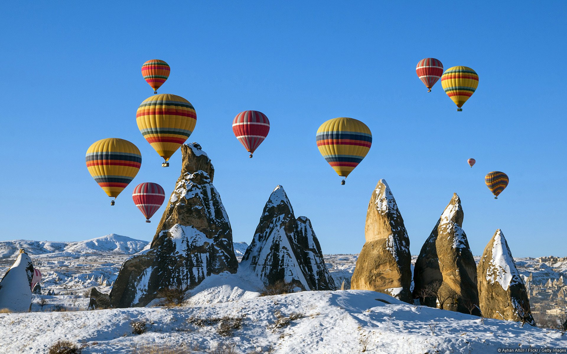 Balloons Over Snowy Cappadocia HD Wallpaper