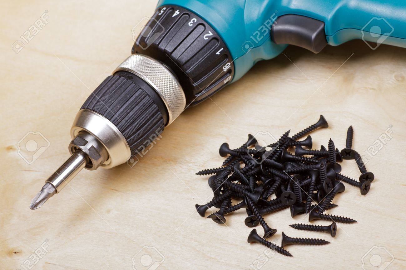 Cordless Drill With Screws Diy Background Stock Photo Picture And