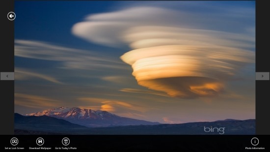 Get Bing Wallpaper Viewer for Windows from here Also try out Bing