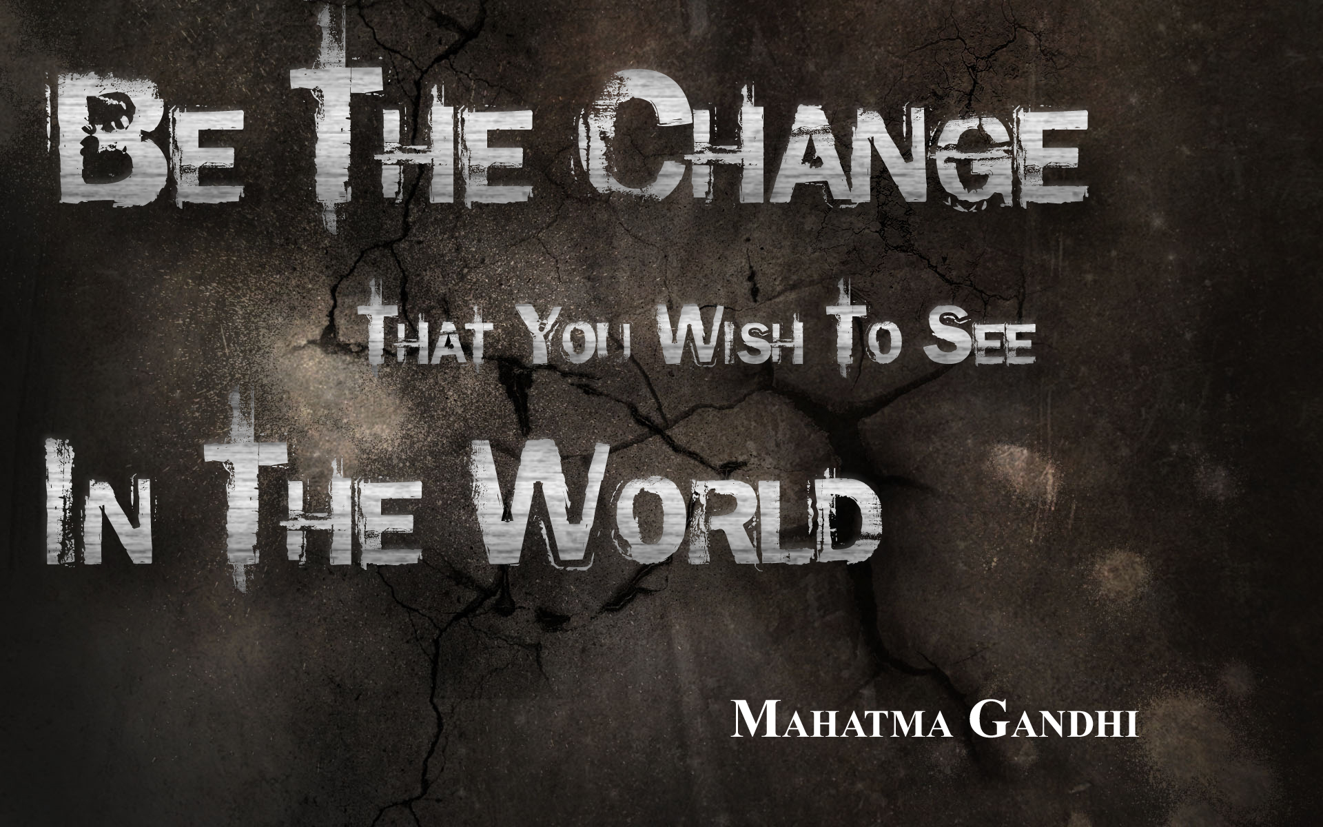 A motivational quote by Mahatma Gandhi on a cracked wall background: 