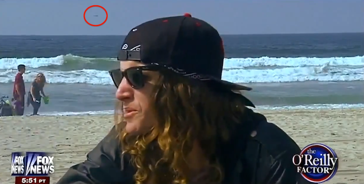 News Interviews Surfer Dude While UFO Casually Passes In Background