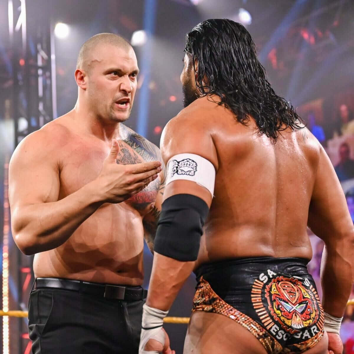 American Wrestler Killer Kross Versus Santos Escobar In Wwe Wallpaper
