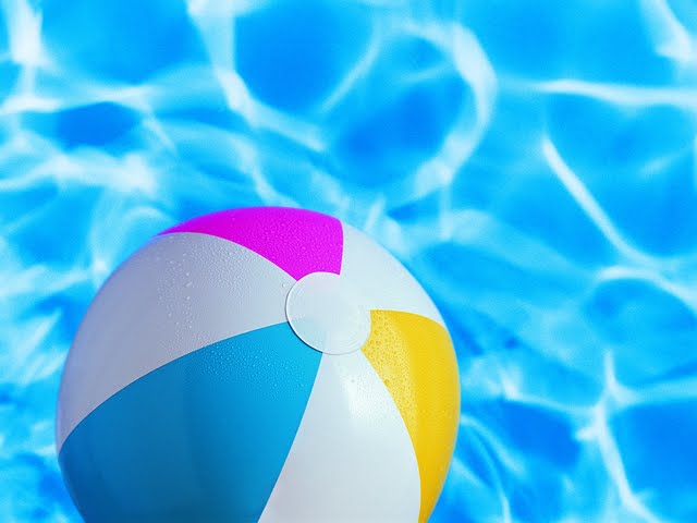 Beach Ball In Swimming Pool Daylight Holiday Inflatable