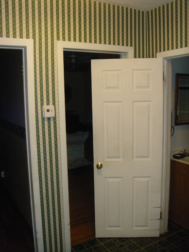 Before we removed the wallpaper and painted this room For a 389x518