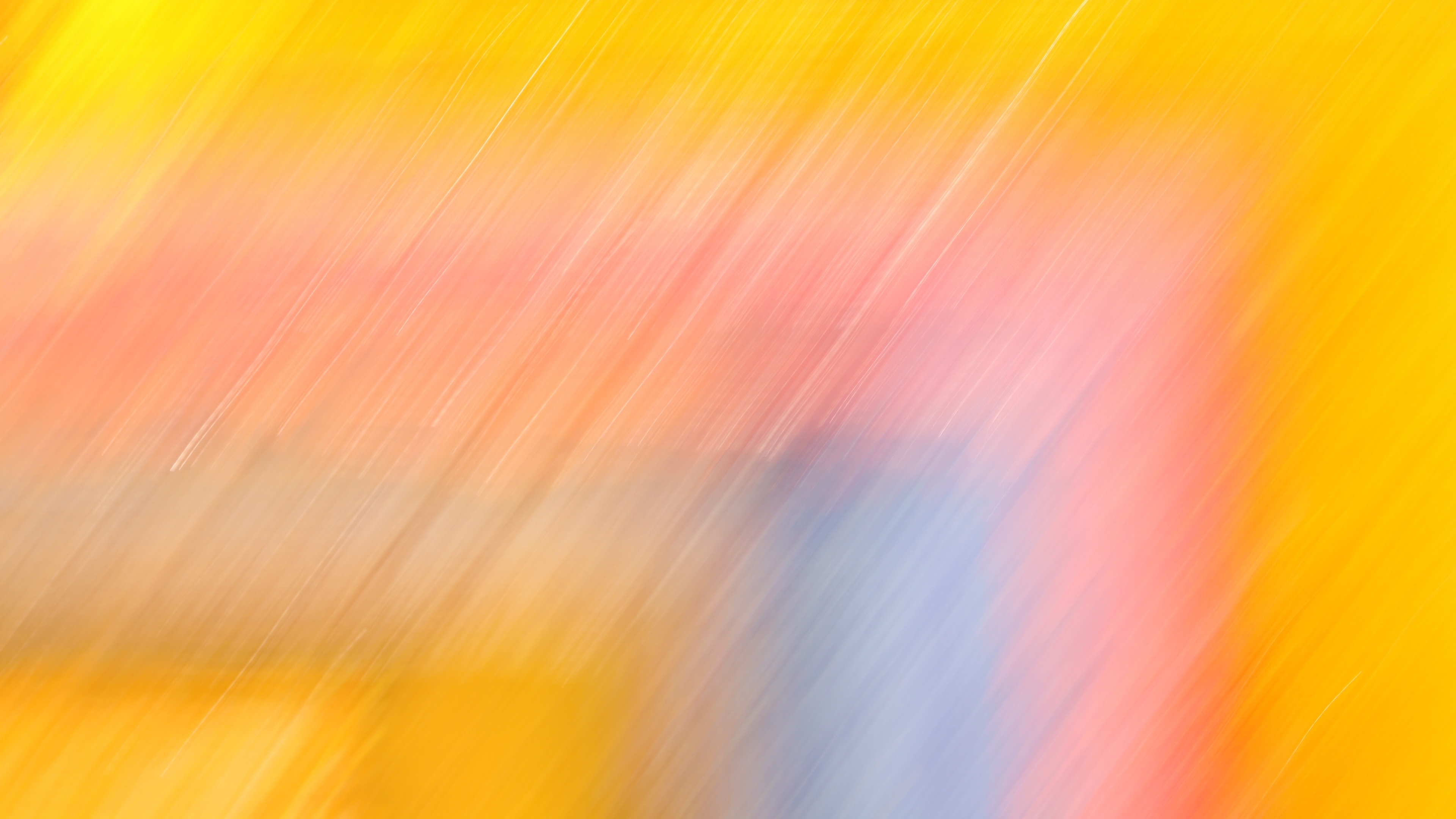 Abstract yellow background with blurred diagonal lines of pink, orange, and light purple, creating a soft and vibrant gradient effect
