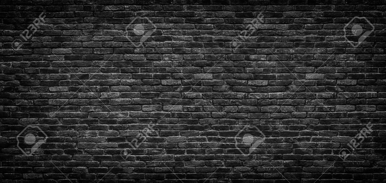 Dark Brick Wall Texture Of A Black Background Stock Photo
