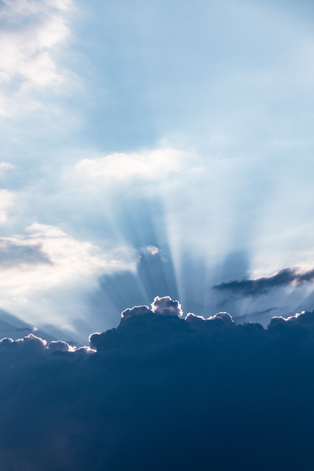 Sun Rays Above Silhouette Of Clouds Photo Sky Image