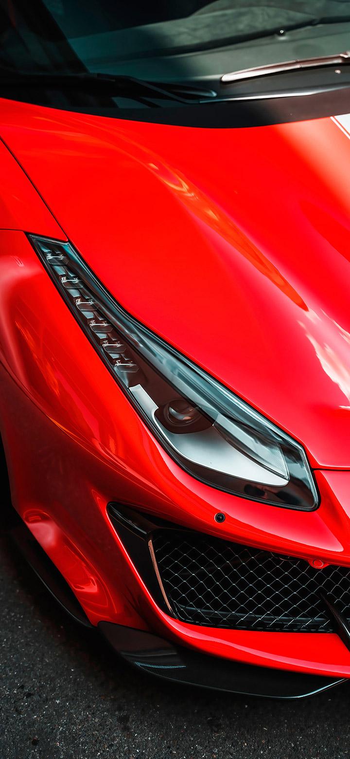 Red Ferrari Car On The Road 4k Phone Wallpaper