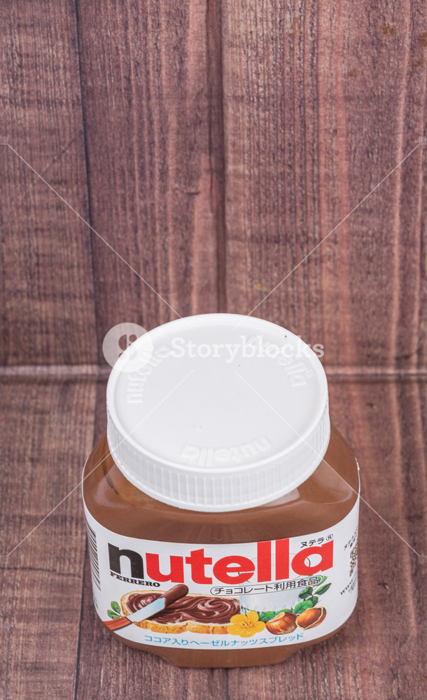 Nutella Over Wooden Background Royalty Stock Image