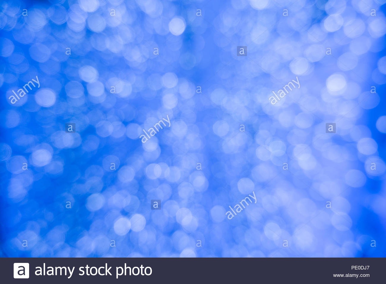 Abstract Blue Bokeh Circles For Christmas Background Royalty High