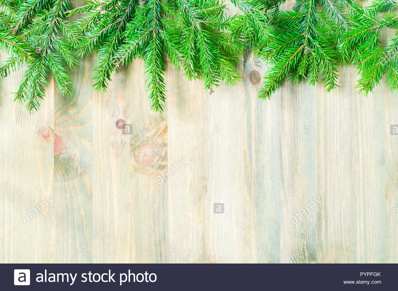 Winter Background Green Fir Tree Branches On The Wooden