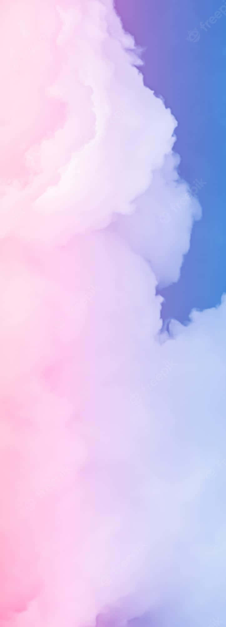 A Captivating Landscape Of Pink And Blue Clouds In The Sky Wallpaper