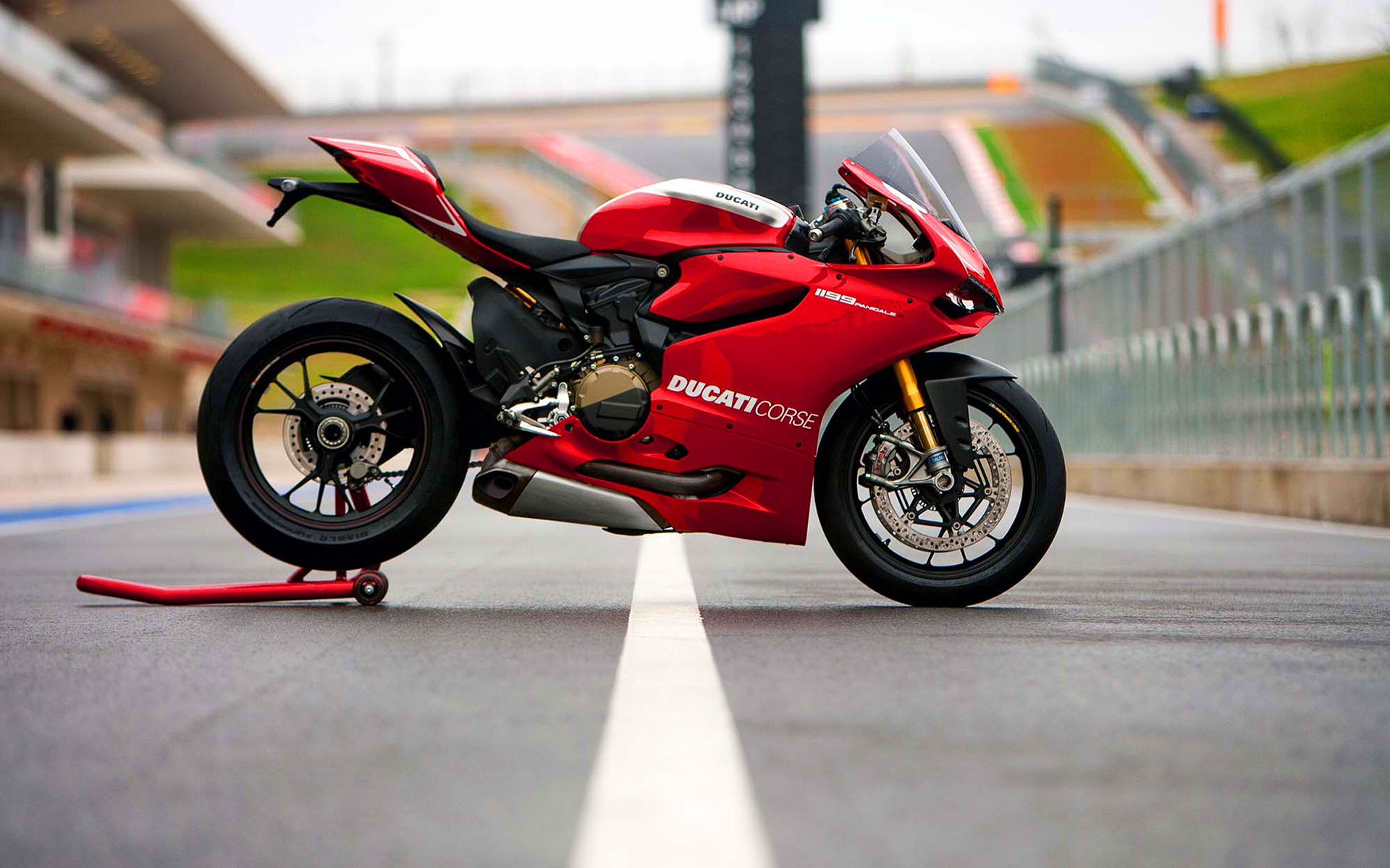 Red Ducati 1199 Panigale S on a racetrack