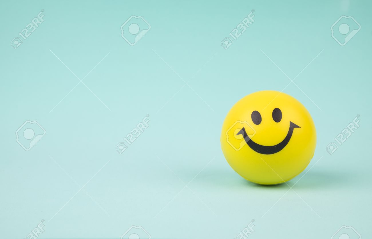 Yellow Laughing Happy Smile Face Smiley Ball On Background