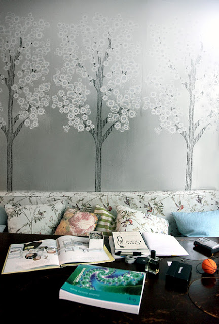 Dining Area Doubles As A Reading Space With Grey Wallpaper Depicting