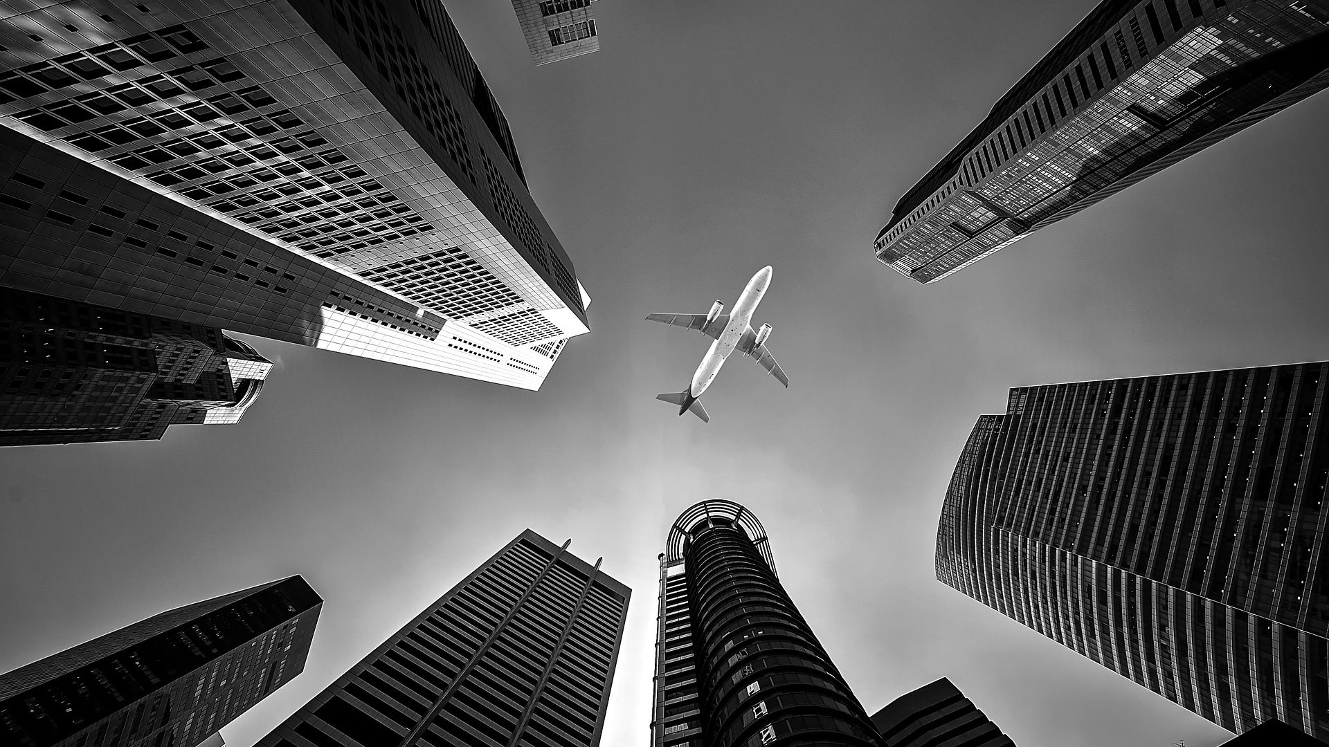 Buildings And Airplane Wallpaper