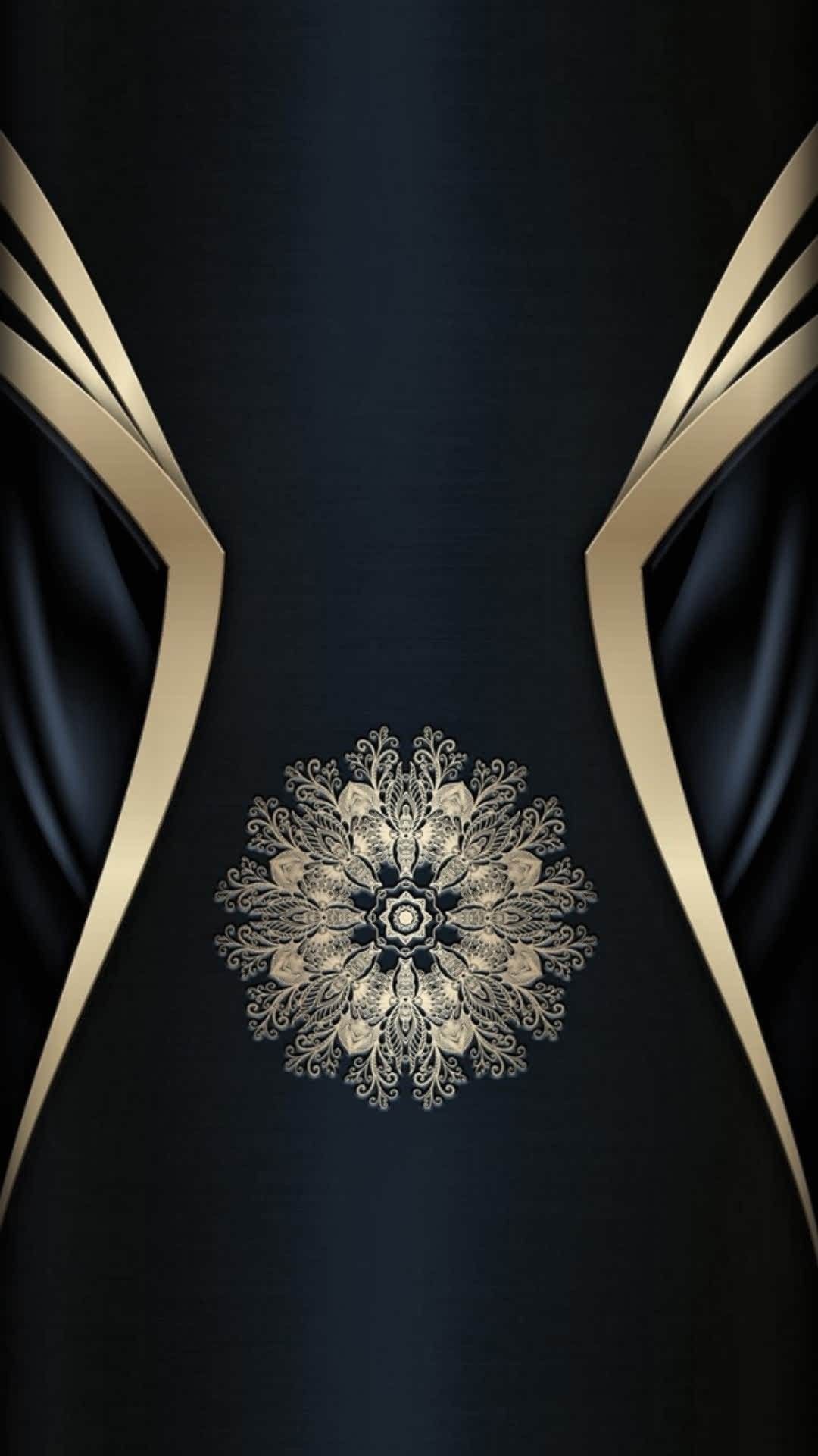 Elegant black and gold phone wallpaper with intricate floral mandala design