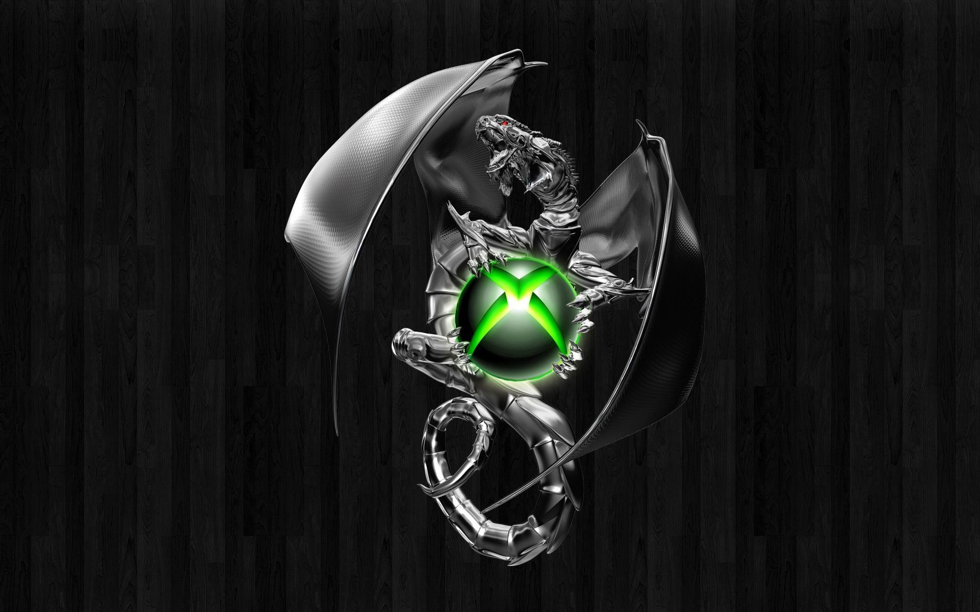A metallic dragon clutches the Xbox logo against a dark wooden background