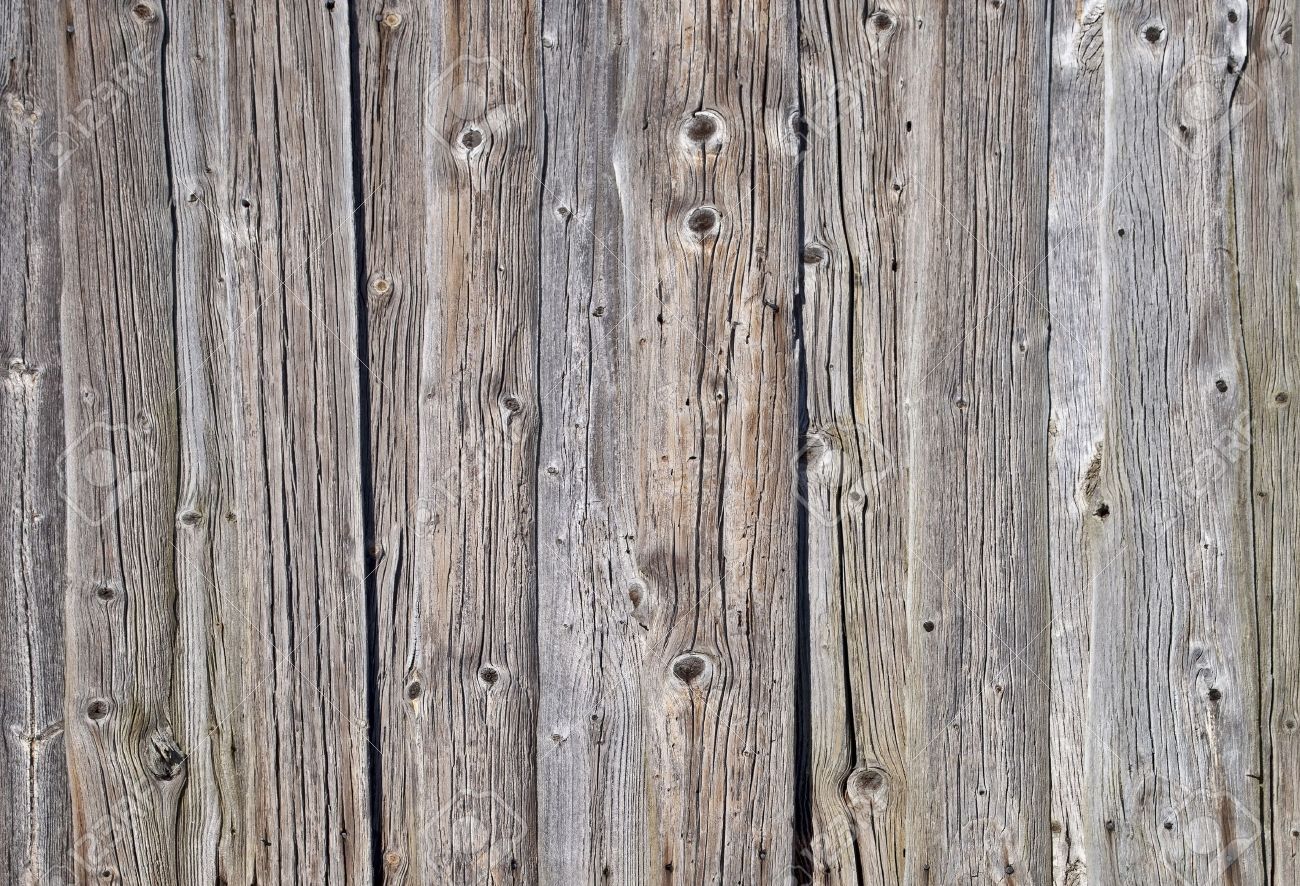 Fragment Of Weathered Rough Uncolored Wooden Boards Background