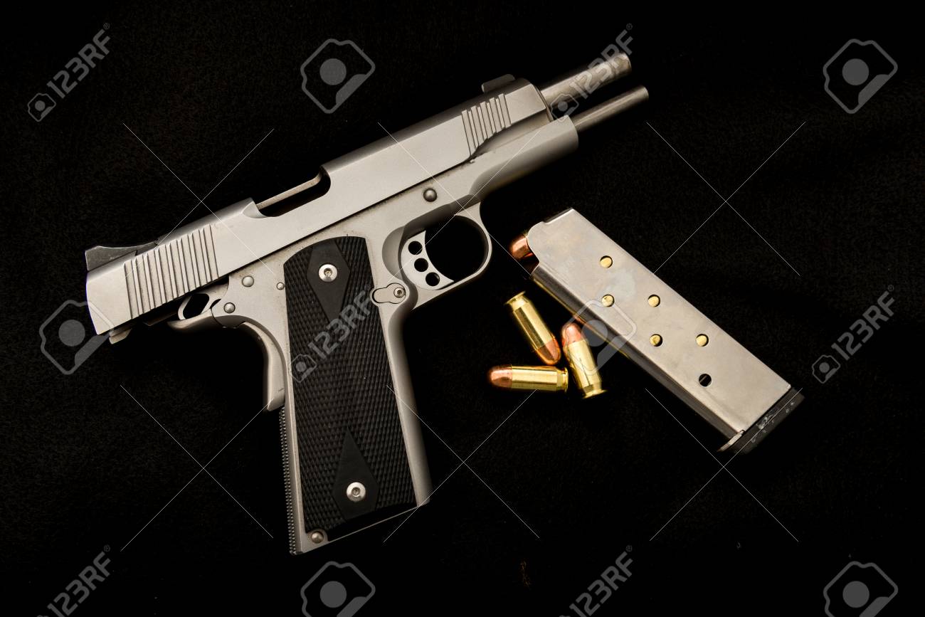 A With Clip And Ammunition On An Isolated Background Stock