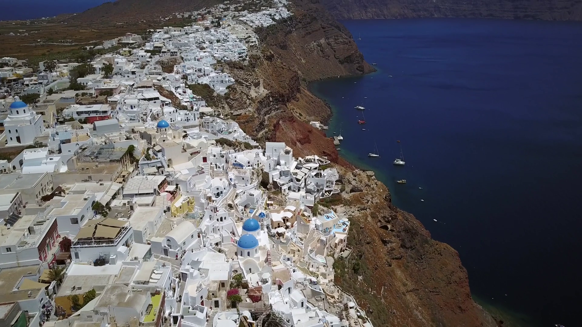 Aerial Footage Of A Cliffside Villiage In Santorini Greece Stock