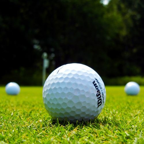 Three Wilson Golf Balls Wallpaper