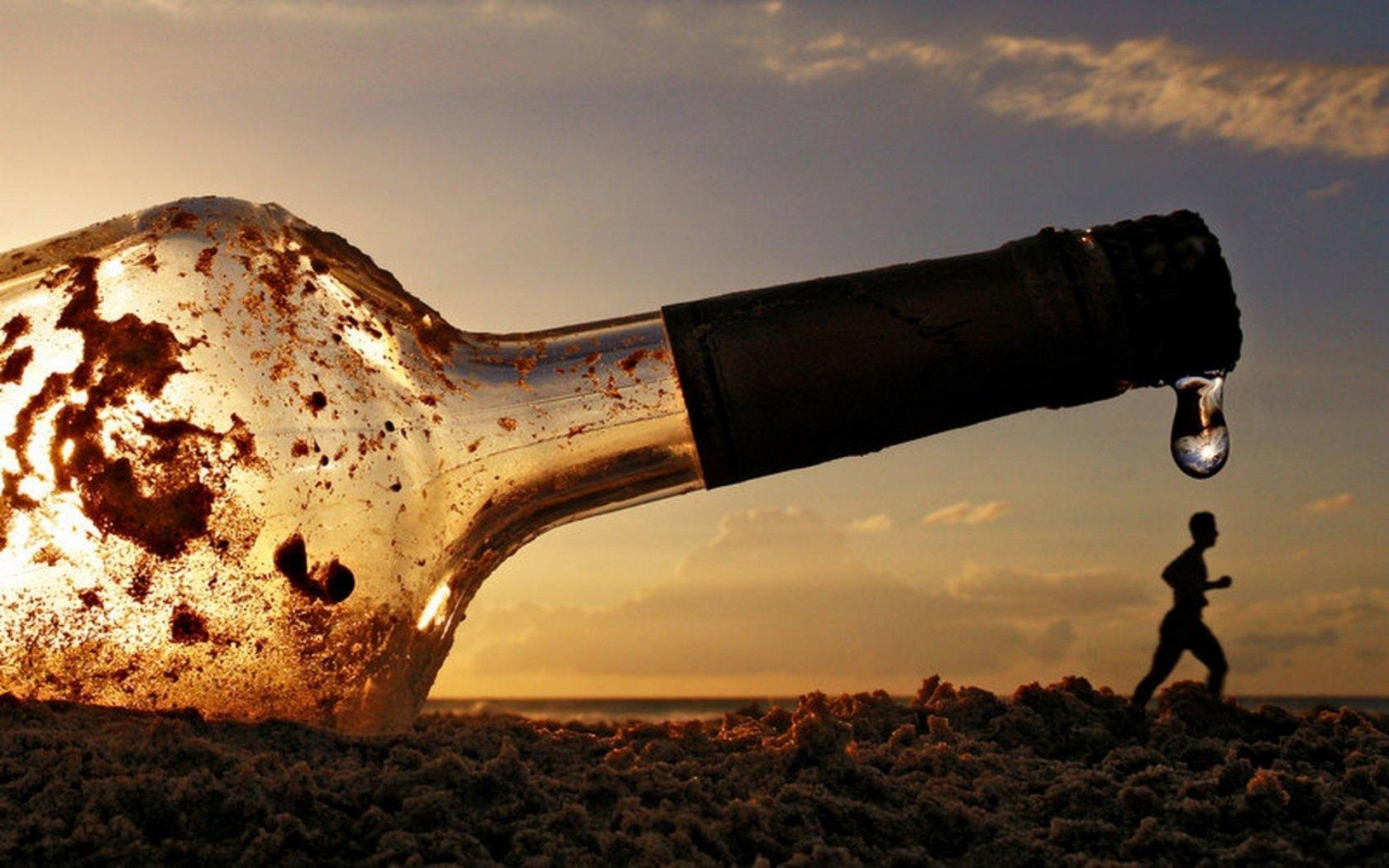 Glass Bottle on Beach | 2000x3000 resolution wallpaper