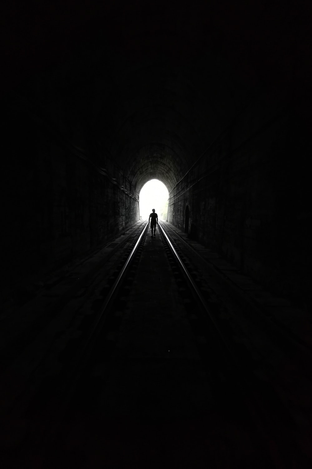 Grayscale Photo Of Tunnel With Light Beijing Image On