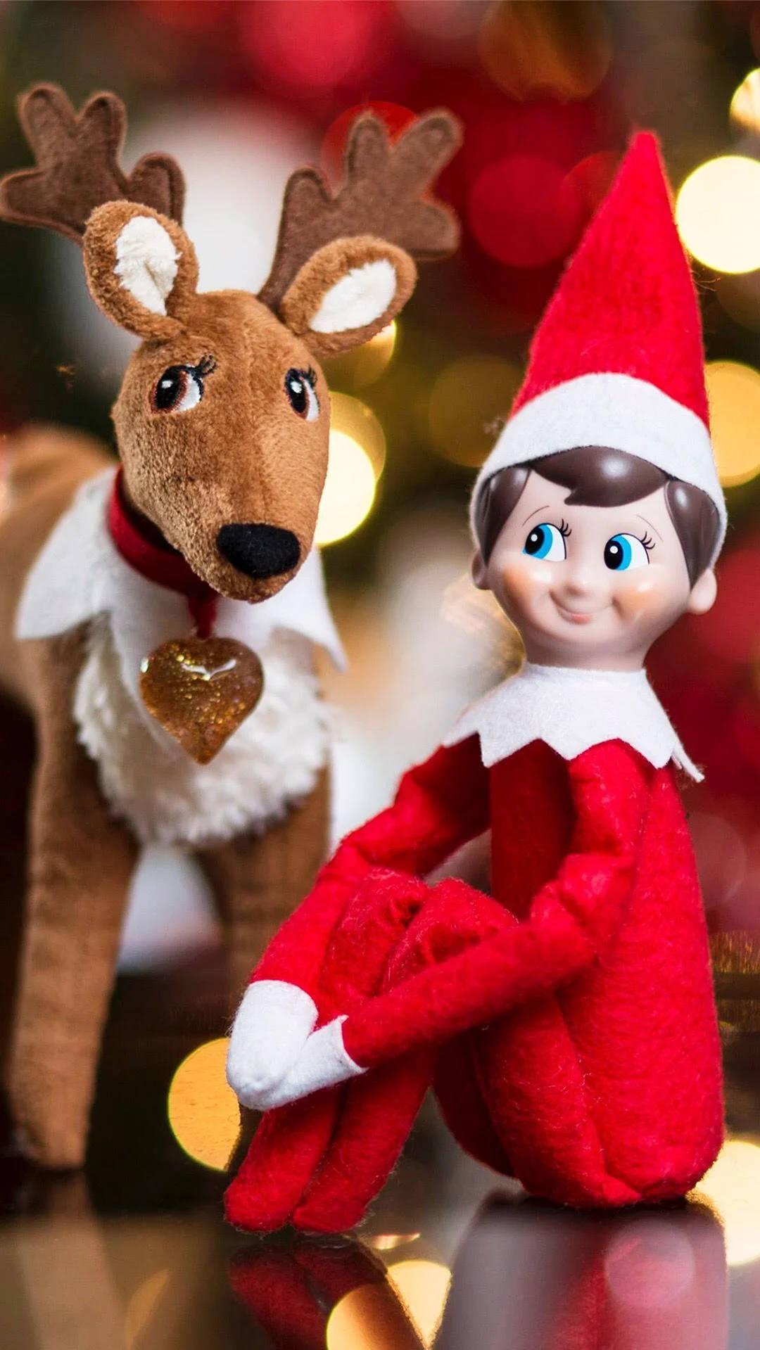 Fun Loving Christmas Elf Spreading Holiday Joy Wallpaper