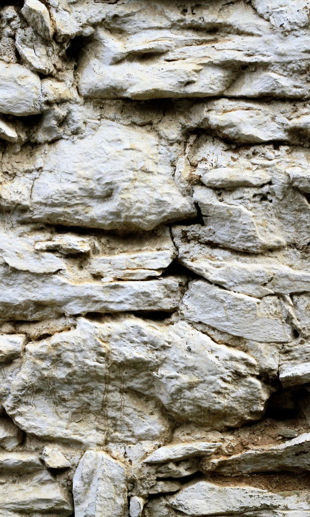 A Close Up Of Stone Wall Wallpaper