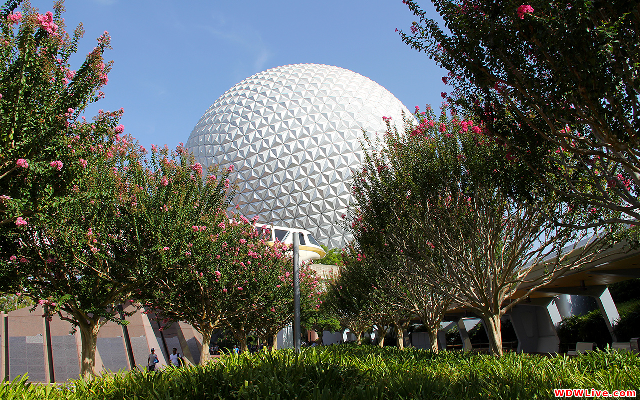 Beautiful Sunny Day At Epcot As The Monorail Passes Spaceship Earth