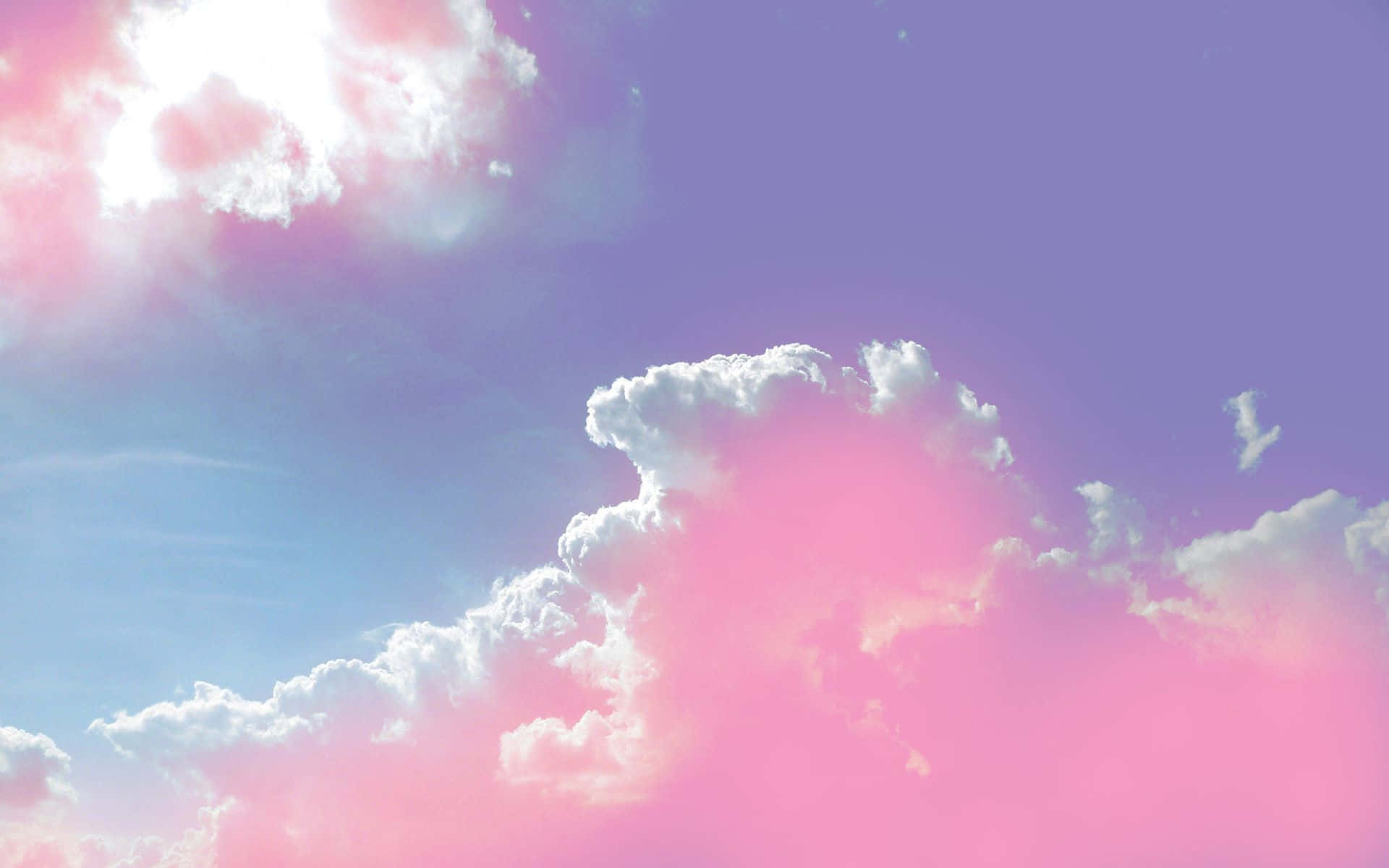 Pink And Blue Clouds In The Sky Wallpaper