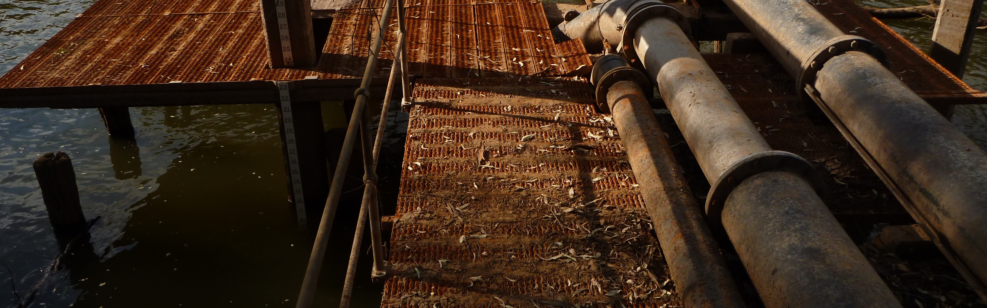 Lovely Linux dual screen wallpaper Rusty platform and water pipes