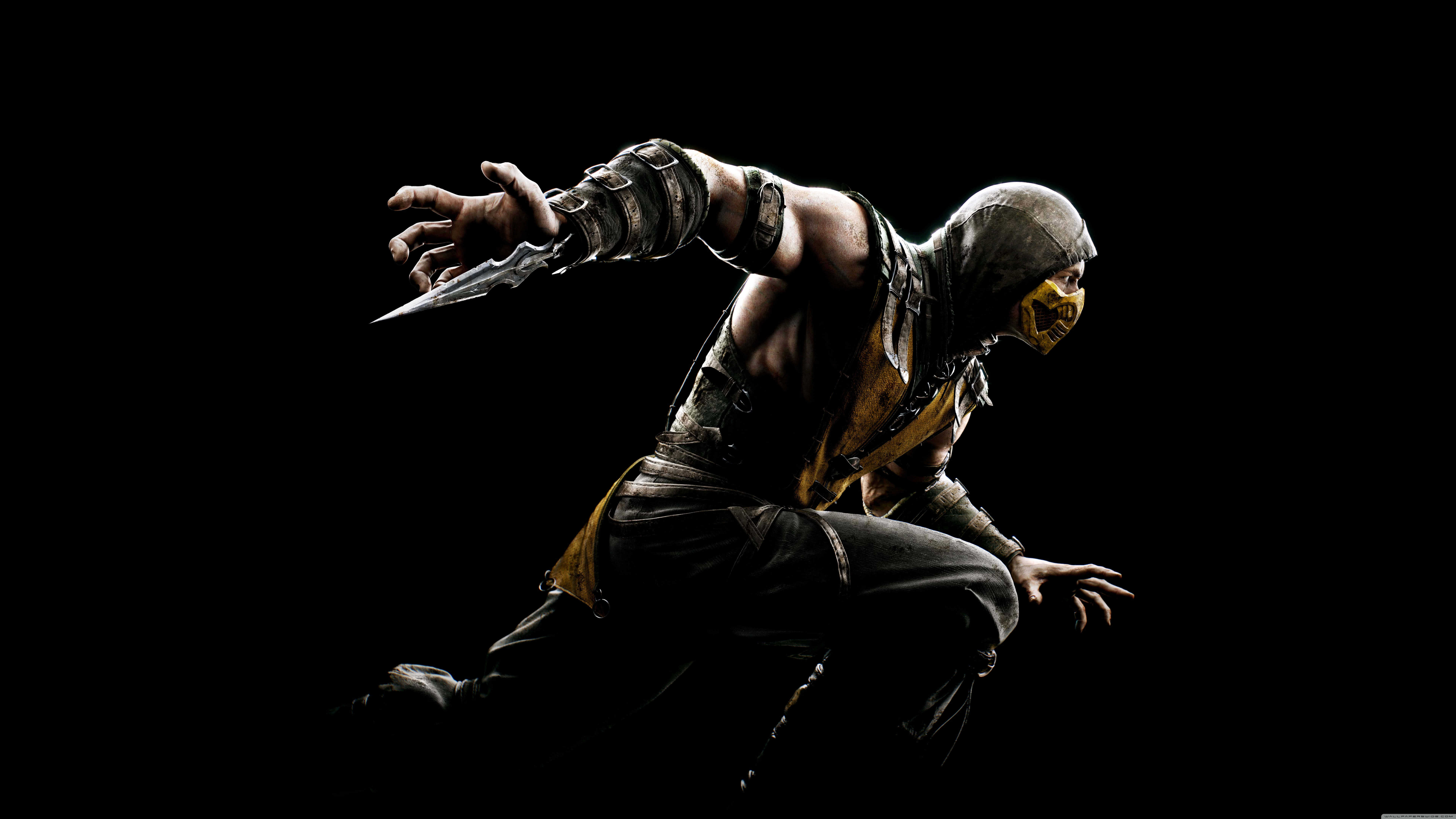 A dynamic action shot of Scorpion from Mortal Kombat, poised in mid-air against a dark background, ready to strike with his kunai