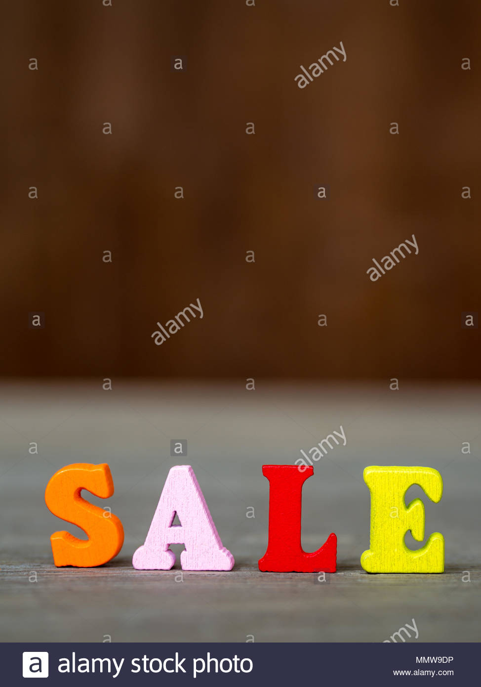 Colorful Wooden Word Sale On Table And Background