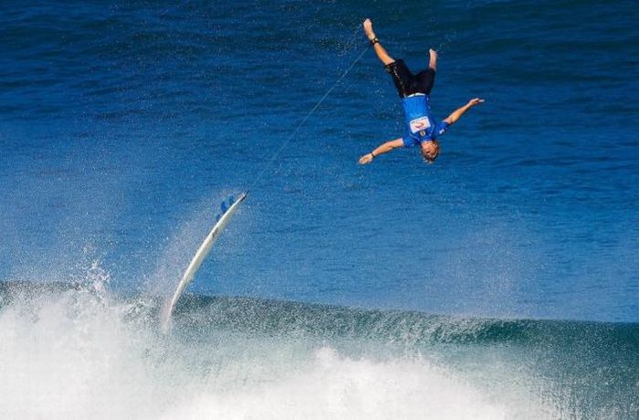 Of Surfer Flying Over A Huge Breaking Wave Banzai Pipeline Hawaii