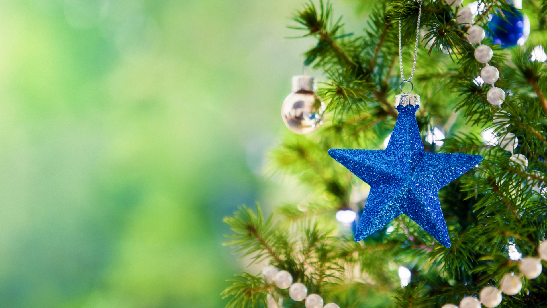 Wallpaper For Blue Star And Ball On The Christmas Tree