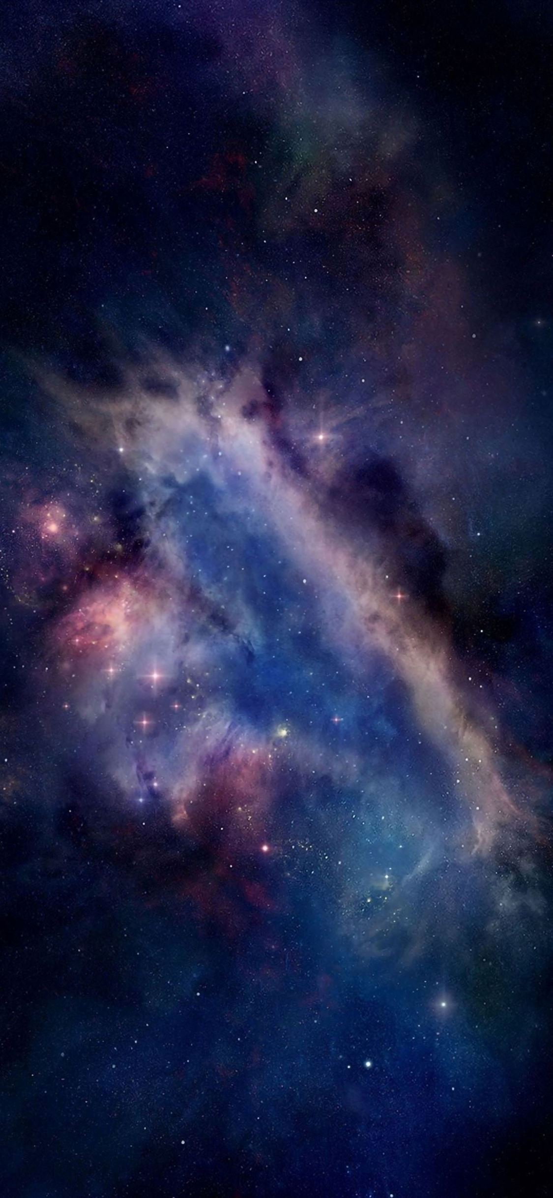 A stunning iPhone wallpaper showcasing the vastness and beauty of the universe, filled with colorful nebulae, sparkling stars, and cosmic dust clouds